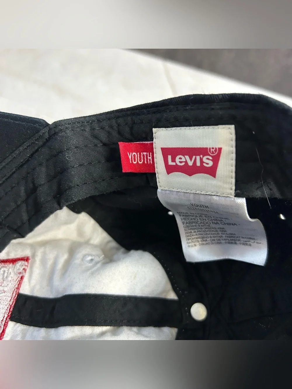Levi's Black and White Kids Baseball Cap with Red Logo